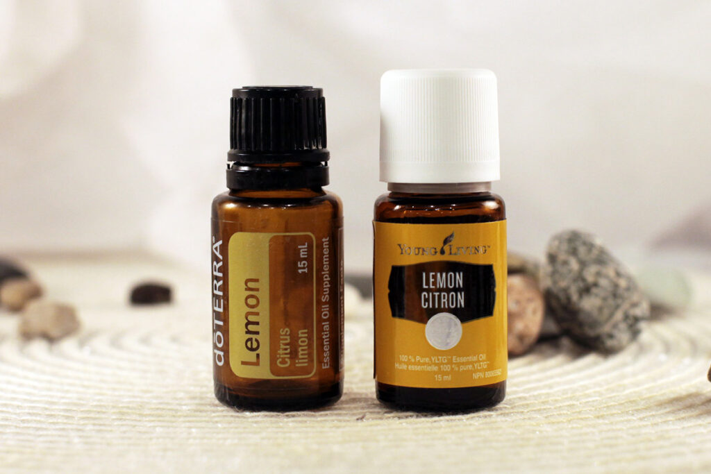 doTERRA and Young Living lemon essential oil bottles